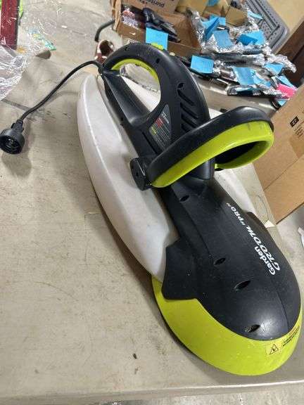 Garden Groom Pro electric head trimmer with plastic trimming bagger attached -works