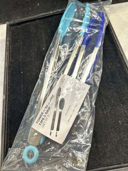 Pair of new Tongs with silicone tips and grips