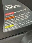 Garden Groom Pro electric head trimmer with plastic trimming bagger attached -works
