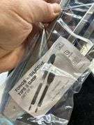 Pair of new Tongs with silicone tips and grips