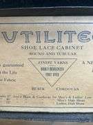 Early Shoe lace store display with old laces inside