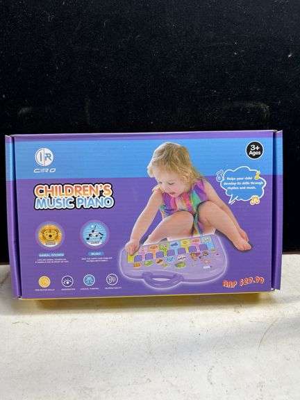 Child’s music piano in box