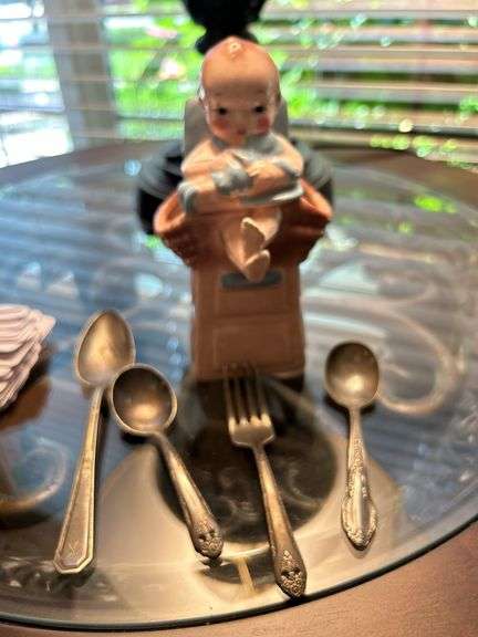 Old baby spoon holder and spoons