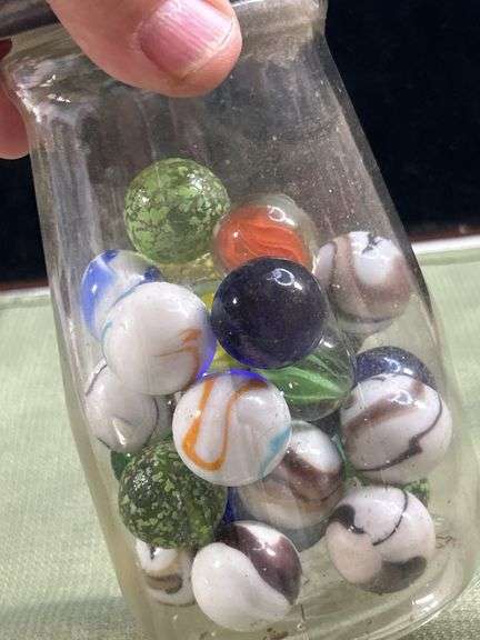 Nice old jar with big Thumper marbles