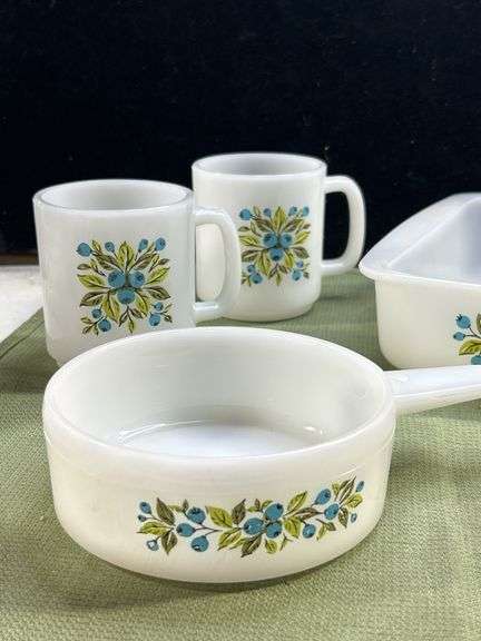 Jeannette Glasbake set in the "Huckleberry" pattern, featuring a square baking dish, a small saucepa