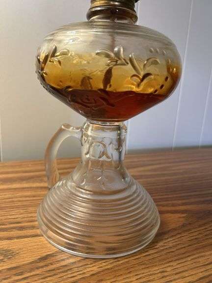 Early finger lamp with embossed designs