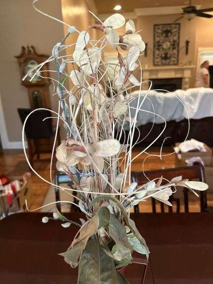 Metal vase with arrangement