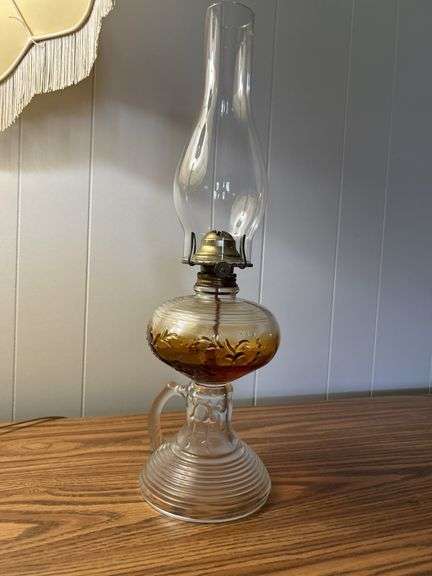 Early finger lamp with embossed designs