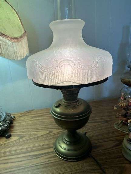 Early Brass lamp with an early embossed satin glass shade