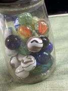 Nice old jar with big Thumper marbles