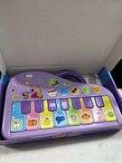 Child’s music piano in box