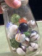 Nice old jar with big Thumper marbles