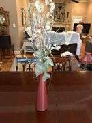 Metal vase with arrangement
