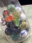 Nice old jar with big Thumper marbles