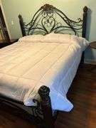 Absolutely gorgeous Kingsize  iron and wood with Night stand (comforter sold separately)
