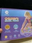 Child’s music piano in box
