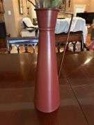 Metal vase with arrangement