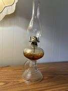 Early finger lamp with embossed designs