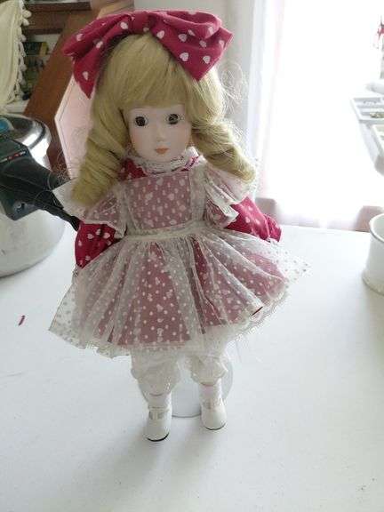 Porcelain doll w/stand