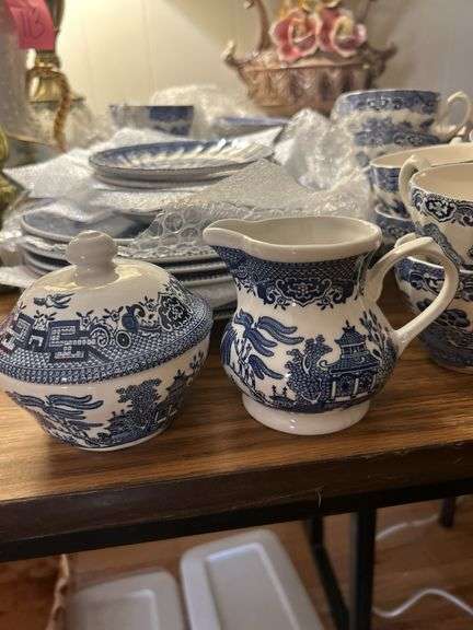 Set of 45+ pices of Blue Willow dishes -with sugar and creamer and salt and pepper shakers