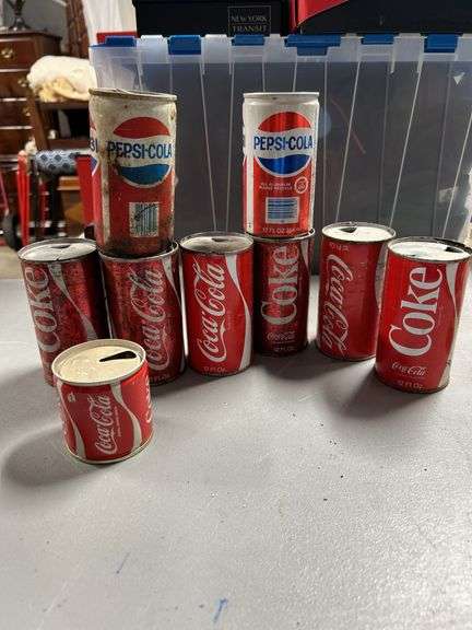 Vintage steel coat cans, and a couple of Pepsi-Cola cans ￼
