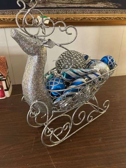 Reindeer sleigh and Christmas ornaments