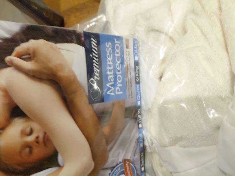 1 new and 1 used King mattress cover