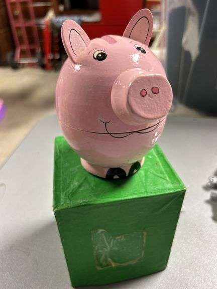 Wooden piggy banks and mini pigs