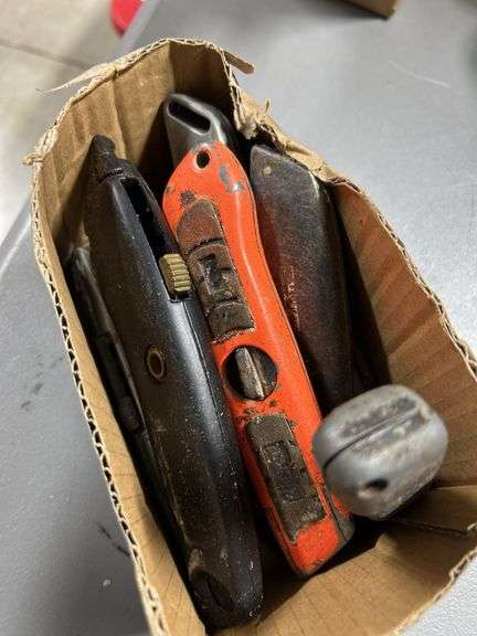 Tray of box cutters
