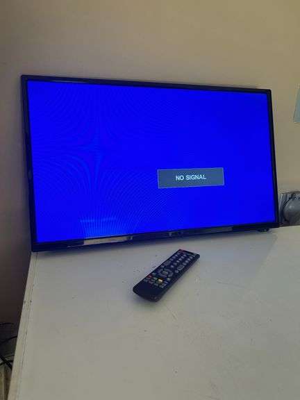 Connexx Model CX28A19  Flatscreen TV with remote -works great (came out of a camper)