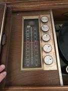 Magnavox console record player with radio and record storage