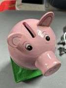 Wooden piggy banks and mini pigs
