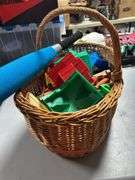 Nice basket of lincoln logs and a toy bat ￼