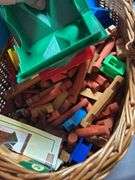 Nice basket of lincoln logs and a toy bat ￼