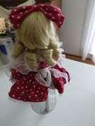Porcelain doll w/stand