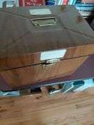 Metal box full of old newspapers