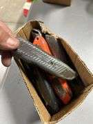 Tray of box cutters