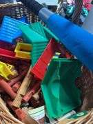 Nice basket of lincoln logs and a toy bat ￼
