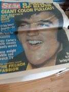 Metal box full of old newspapers