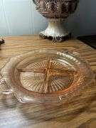 vintage piece of pink Depression glass, specifically an Anchor Hocking Mayfair