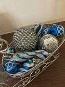 Reindeer sleigh and Christmas ornaments