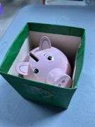 Wooden piggy banks and mini pigs