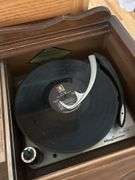 Magnavox console record player with radio and record storage