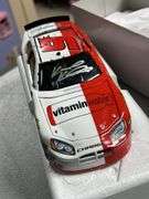 Motorsports authentic 1/24 scale signed by the driver and also the car owner Kasey Kahne & Ray Abrah