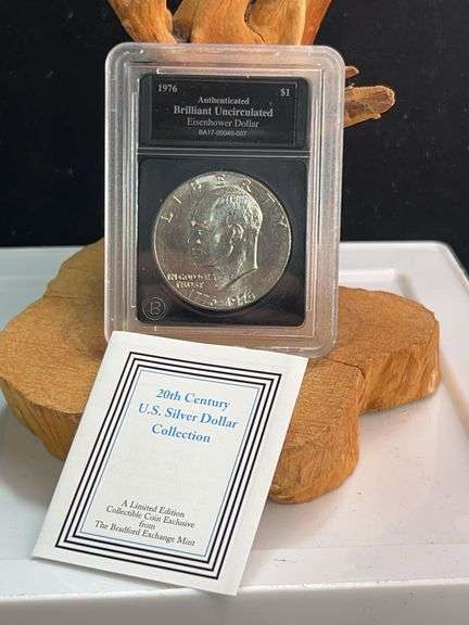 1976 authenticated brilliant uncirculated Eisenhower dollar ￼