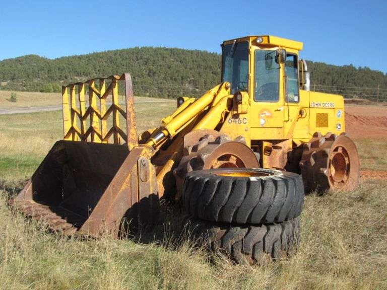 JOHN DEERE 646C 4 WHEEL COMPACTION DOZER W/ LAND FILL BUCKET AND PUSH