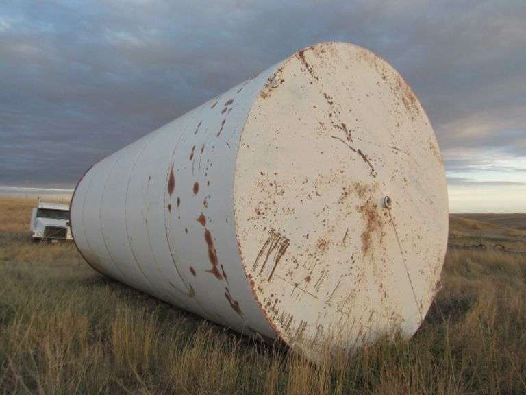 STEEL LIQUID STORAGE TANK 12' DIAM X 25' TALL McPherson Auction & Realty