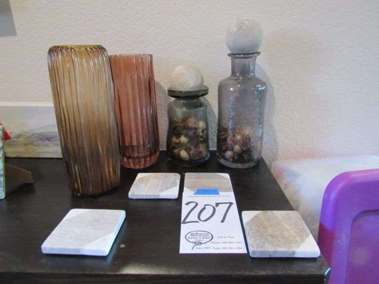 FOUR PIECES OF GLASSWARE AND FOUR STONE COASTERS