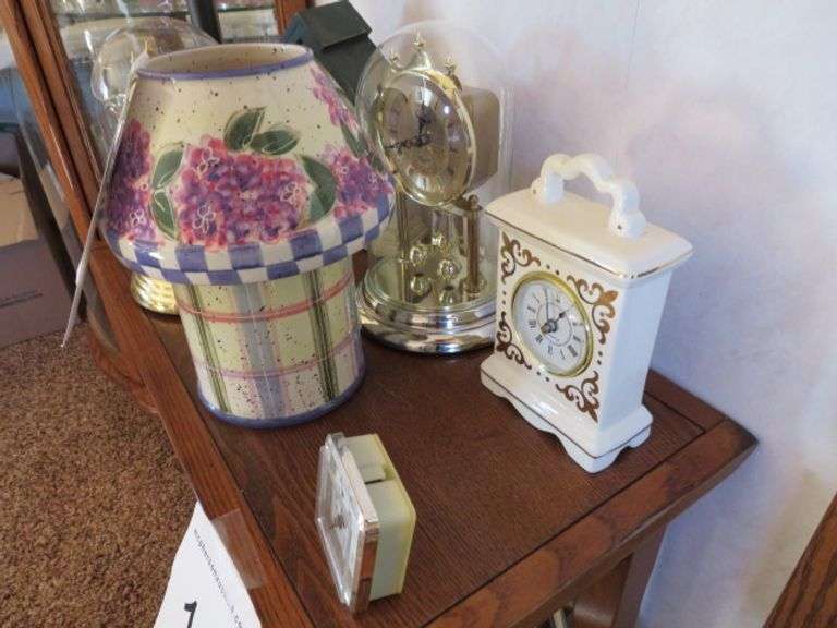 7 ASORTED CLOCKS AND A CANDLE HOLDER