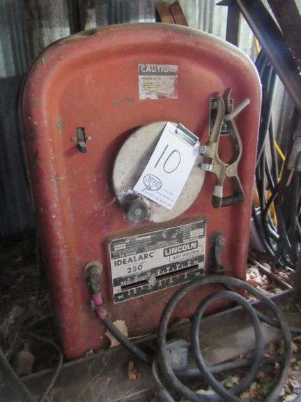 LINCOLN ARC WELDER MODEL IDEALARC250 WITH LEADS AND GROUND